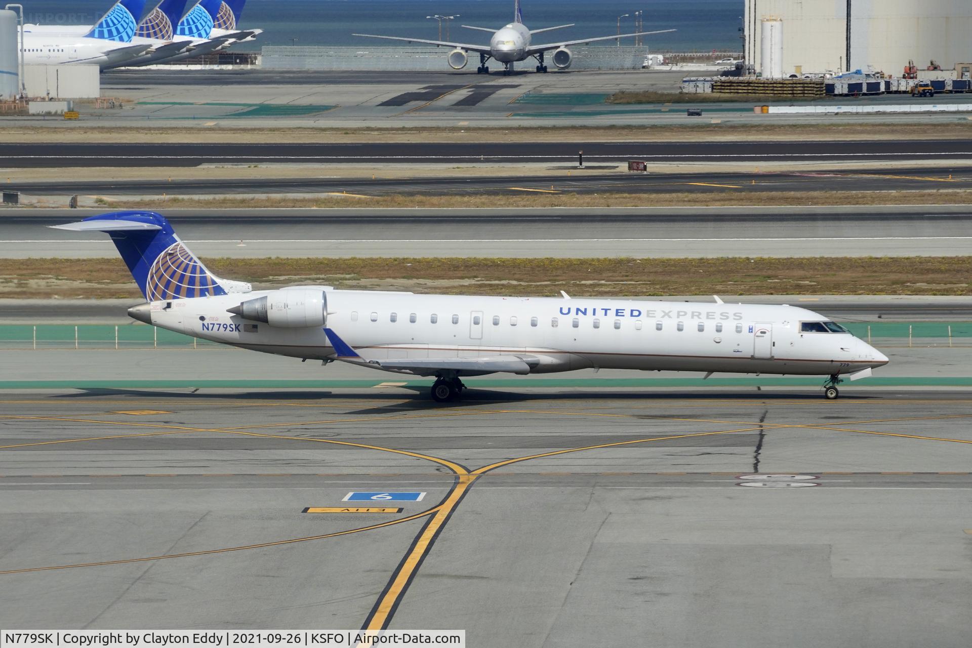 N779SK, 2009 Bombardier CRJ-702 (CL-600-2C10) Regional Jet C/N 10276, Sky Terrace SFO 2021.