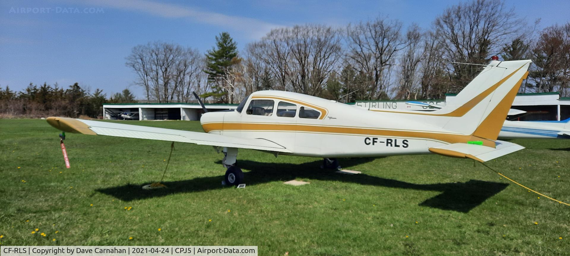 CF-RLS, 1964 Beech A23 C/N M-624, Generally parked inside a unique dome shaped hangar at Stirling airport (CPJ5), here is CF-RLS parked on the grass at same airport.