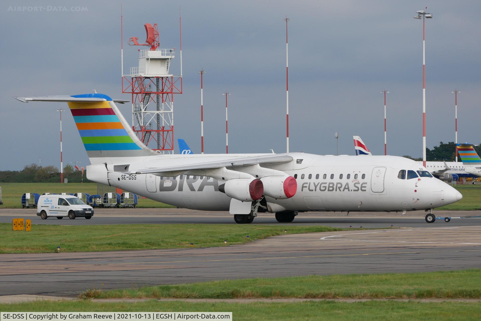 SE-DSS, 1994 British Aerospace Avro 146-RJ100 C/N E3245, Under tow at Norwich.
