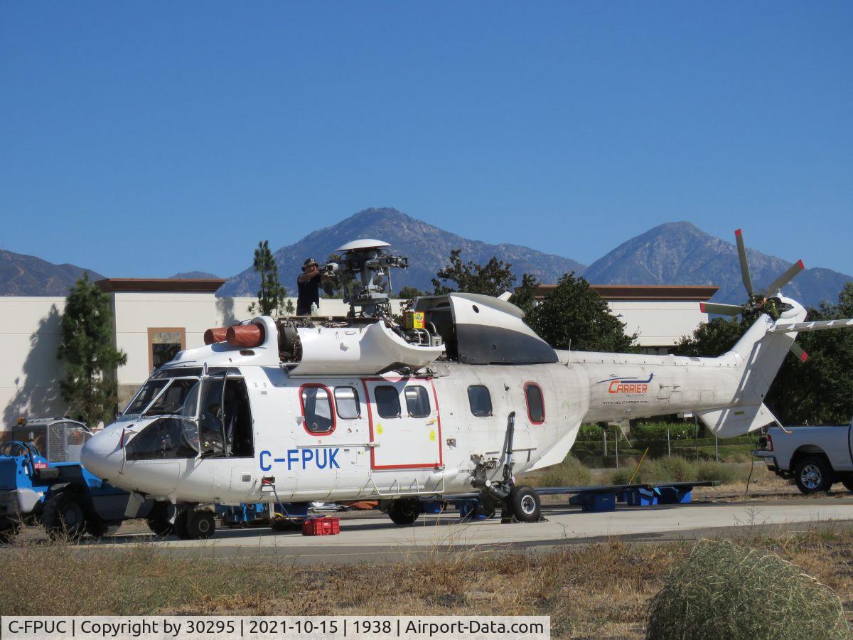 C-FPUK, 1990 Aerospatiale AS-332L-1 Super Puma C/N 2319, Working on the bird