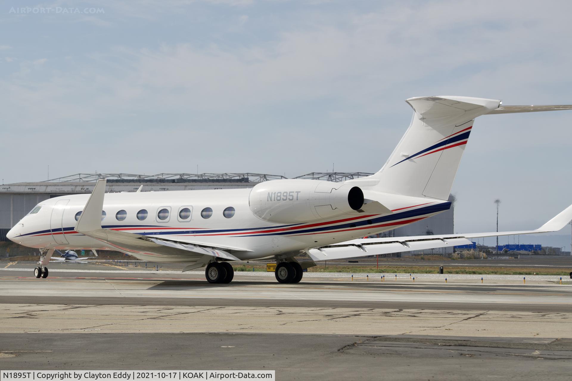 N1895T, 2018 Gulfstream Aerospace GVI (G650ER) C/N 6346, North Field Oakland airport 2021.