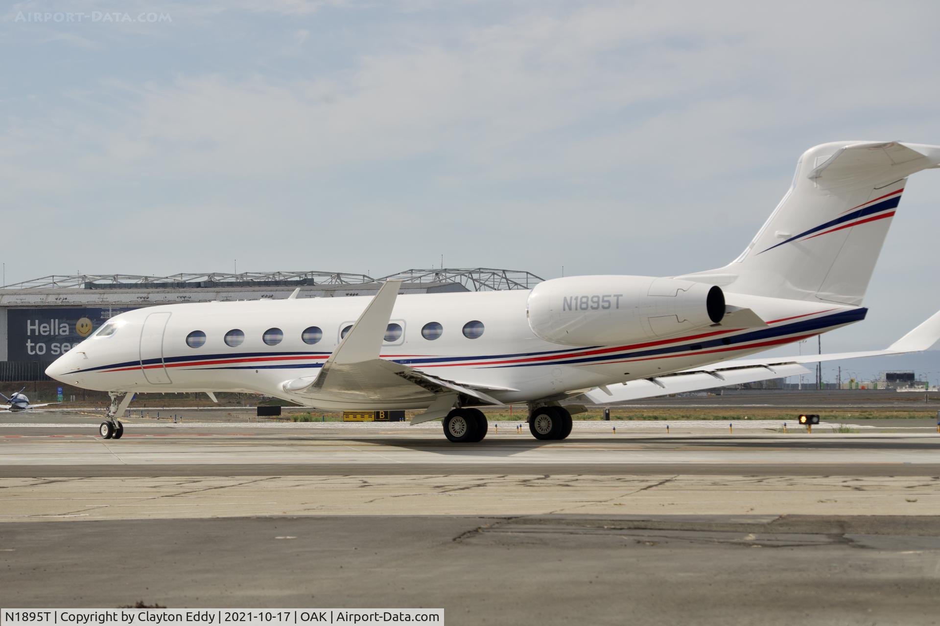 N1895T, 2018 Gulfstream Aerospace GVI (G650ER) C/N 6346, North Field Oakland airport 2021.
