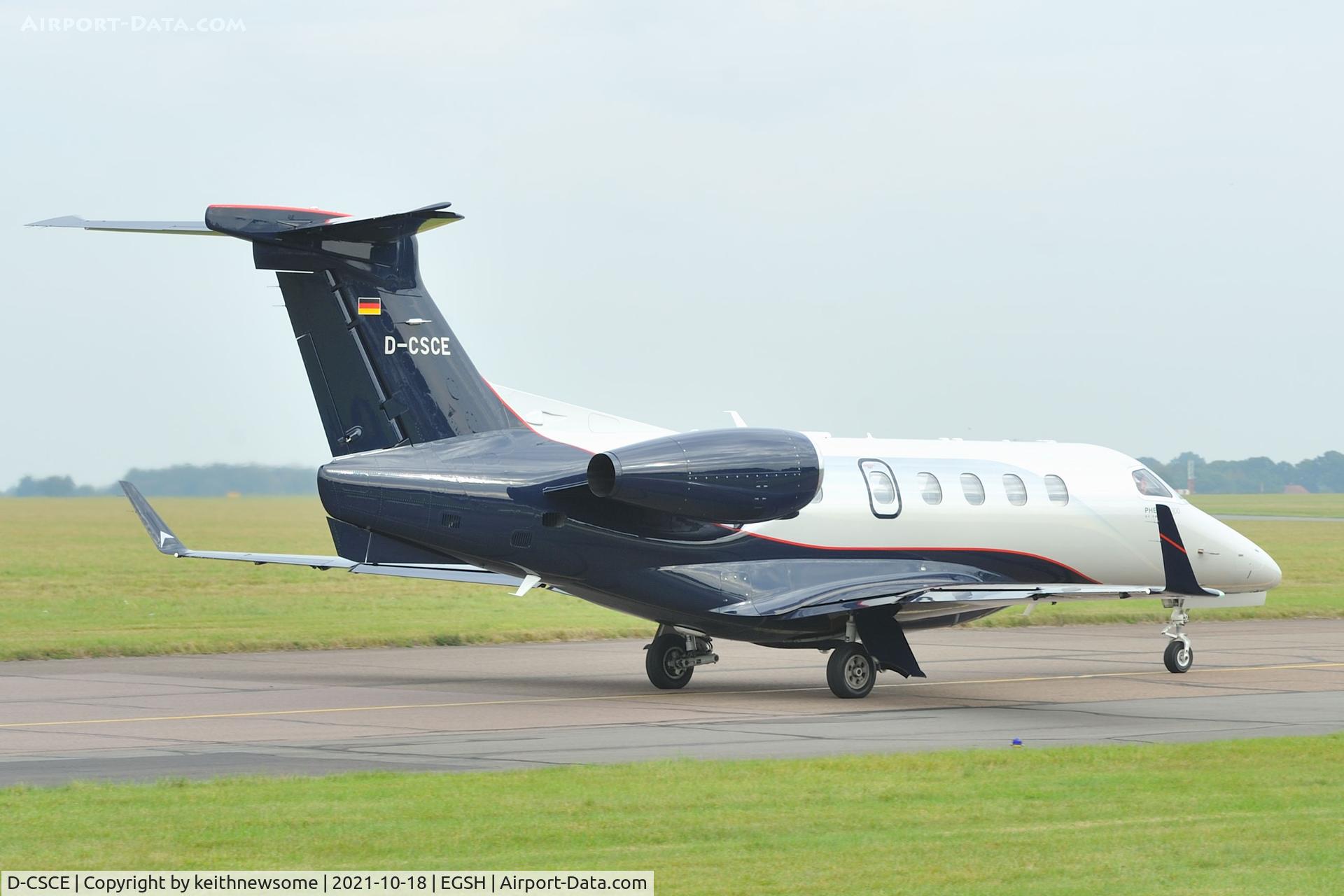 D-CSCE, 2017 Embraer EMB-550 Phenom 300 C/N 50500424, Leaving Norwich.