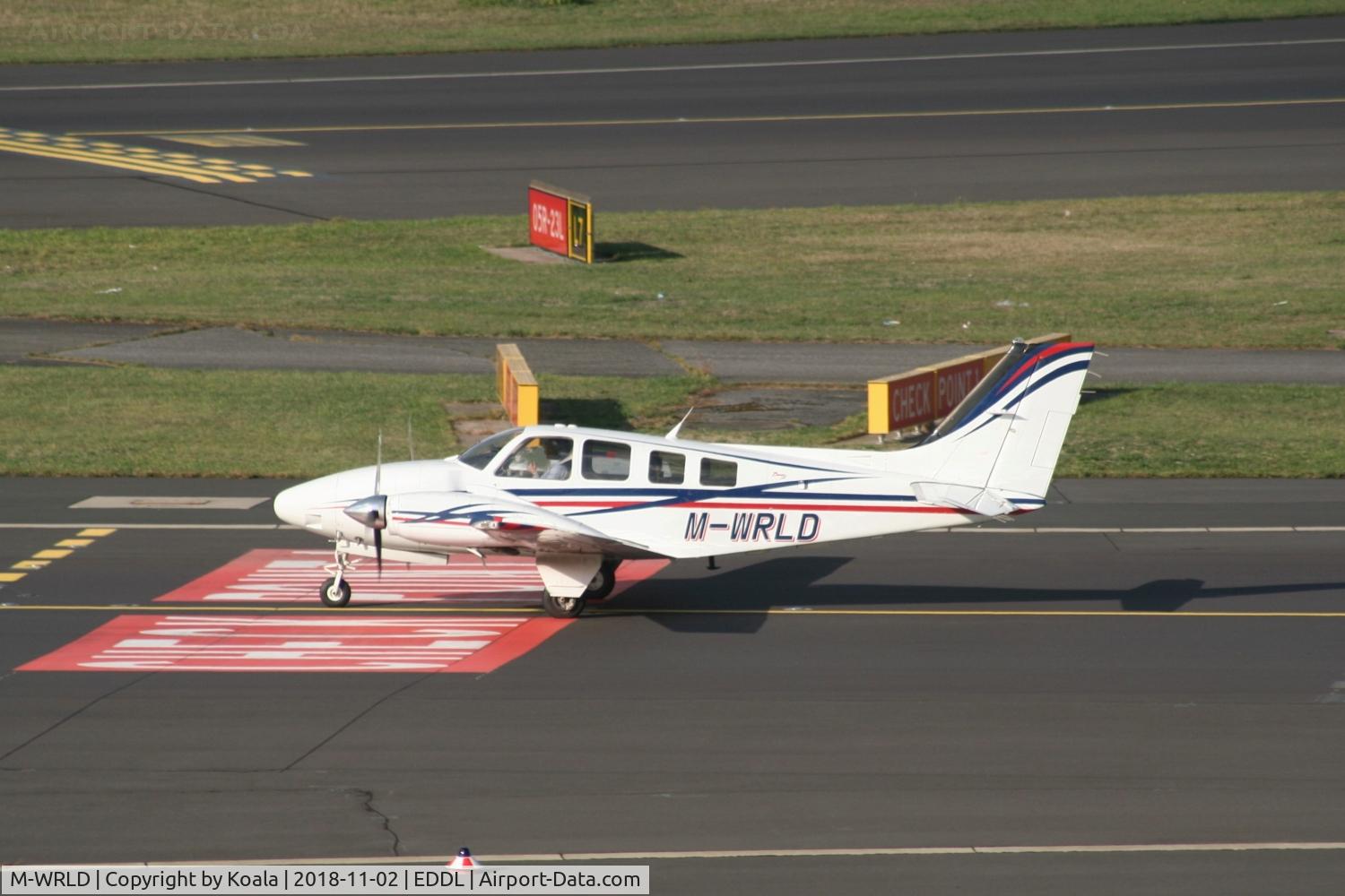 M-WRLD, 2001 Raytheon 58 Baron C/N TH-2001, Taxing to GAT