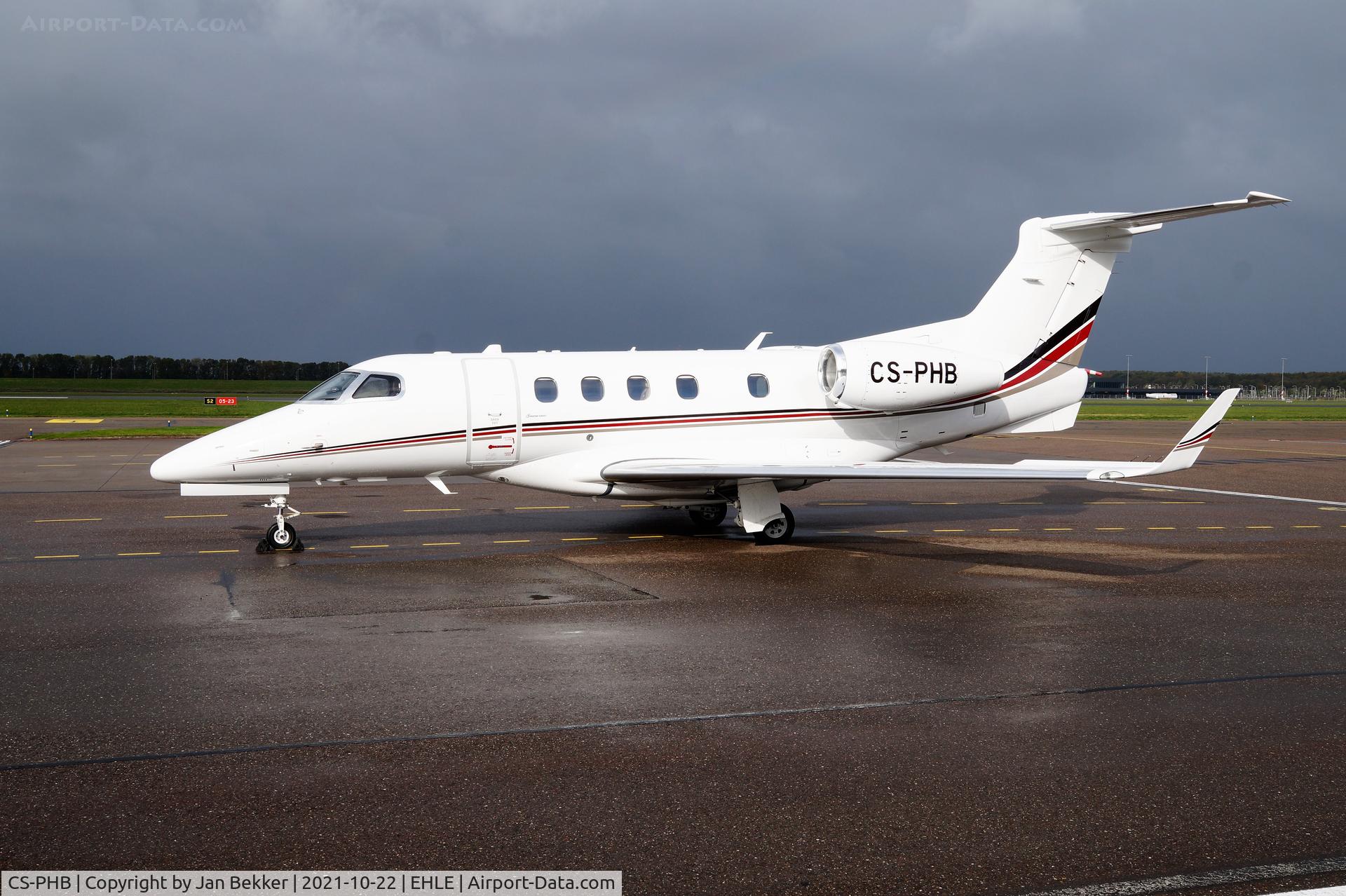 CS-PHB, 2014 Embraer EMB-505 Phenom 300 C/N 50500209, Lelystad Airport between two heavy showers