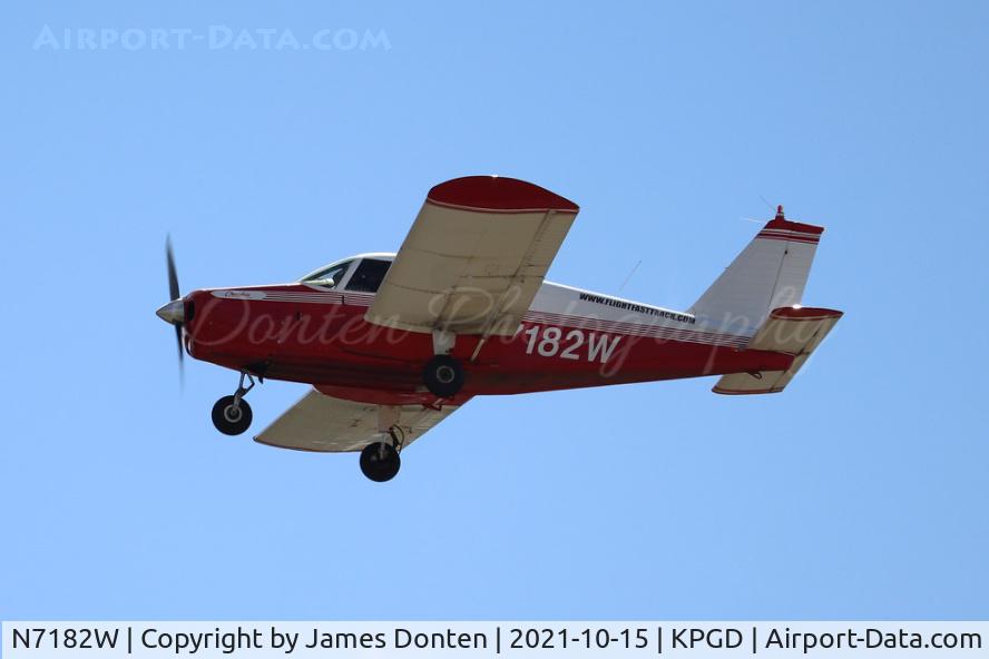 N7182W, 1963 Piper PA-28-180 C/N 28-991, Piper Cherokee (N7182W) departs Runway 4 at Punta Gorda Airport