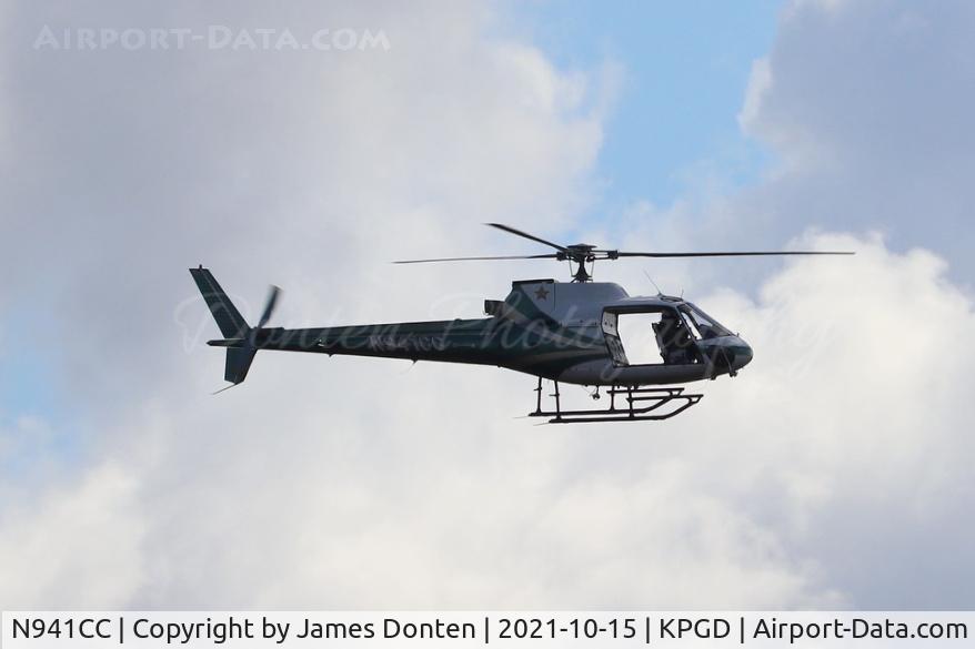 N941CC, 1991 Aérospatiale AS-350BA C/N 2471, Charlotte County Sheriff's Office Aerospatiale AS350BA (N941CC) flies over the field at Punta Gorda Airport in advance of Friday's practice show