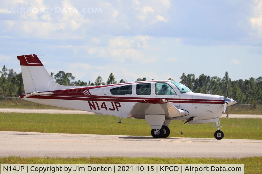 N14JP, 1986 Beech F33C Bonanza C/N CJ-177, Jim Peitz performs in the Beechcraft Bonanza during the Florida International Air Show