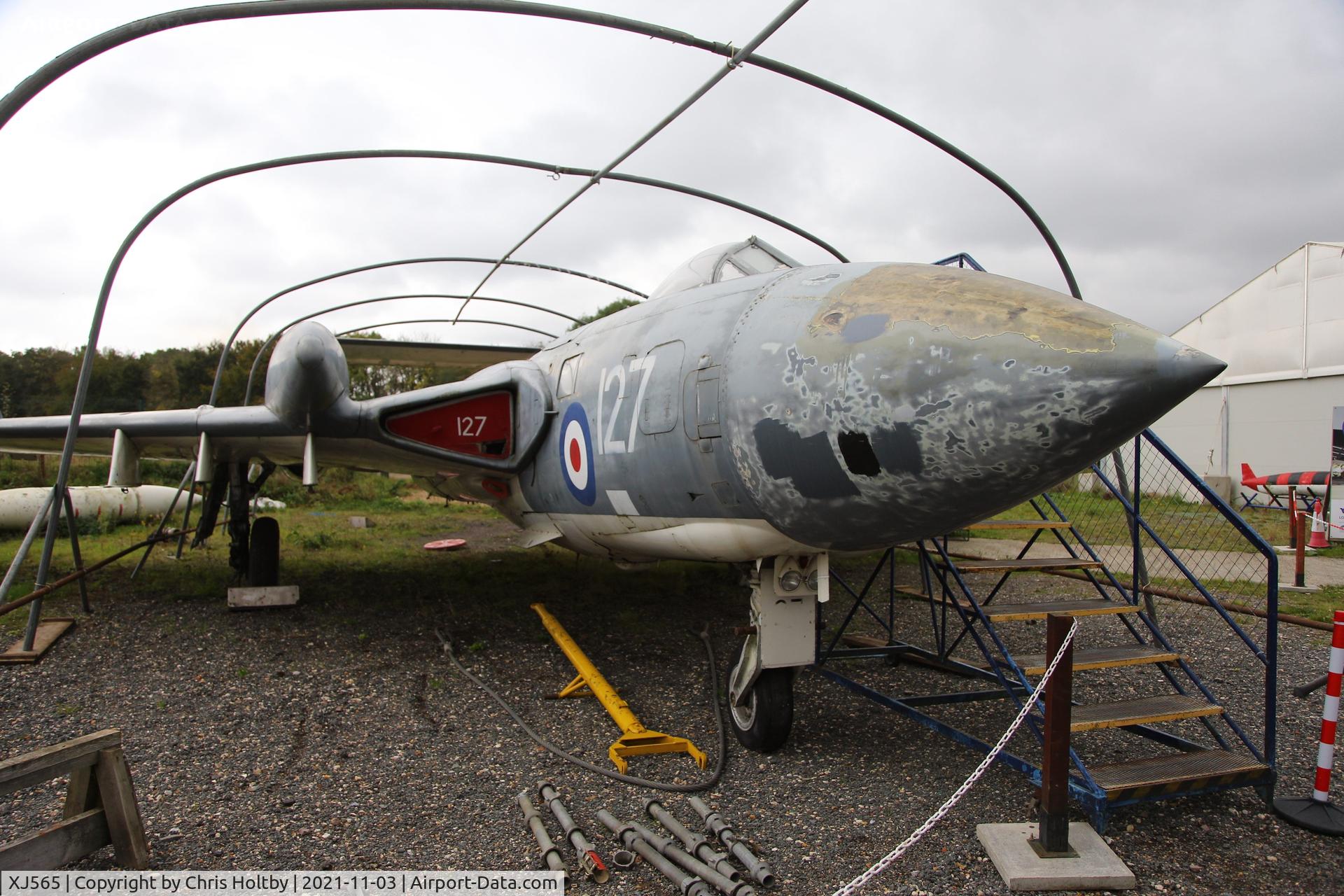 XJ565, De Havilland DH-110 Sea Vixen FAW.2 C/N 10047, Preserved but deteriorating outside (hence the shelter being built for her) at the De Havilland Aircraft Museum in London Colney, Herts.