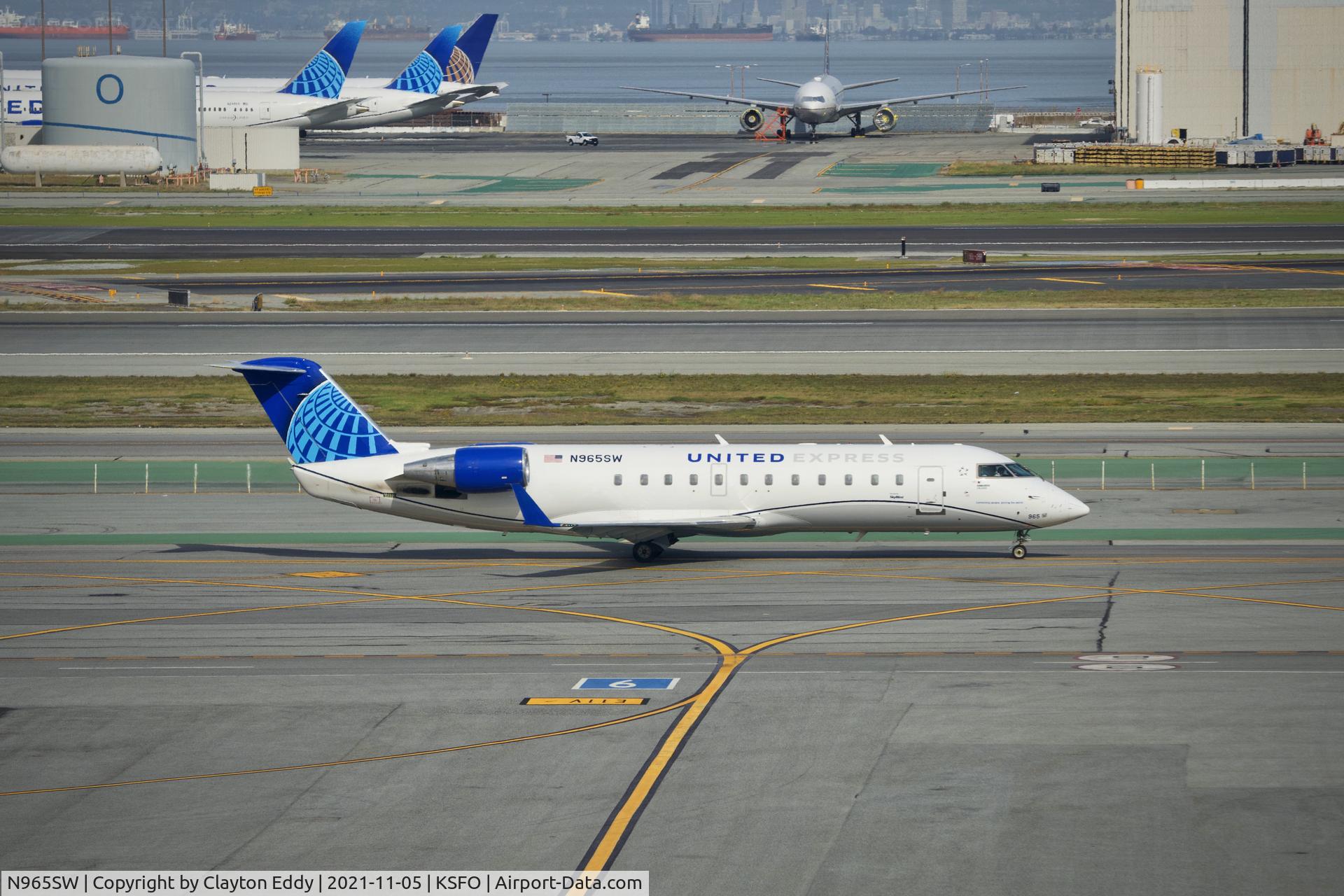 N965SW, 2003 Bombardier CRJ-200ER (CL-600-2B19) C/N 7871, Sky Terrace SFO 2021.