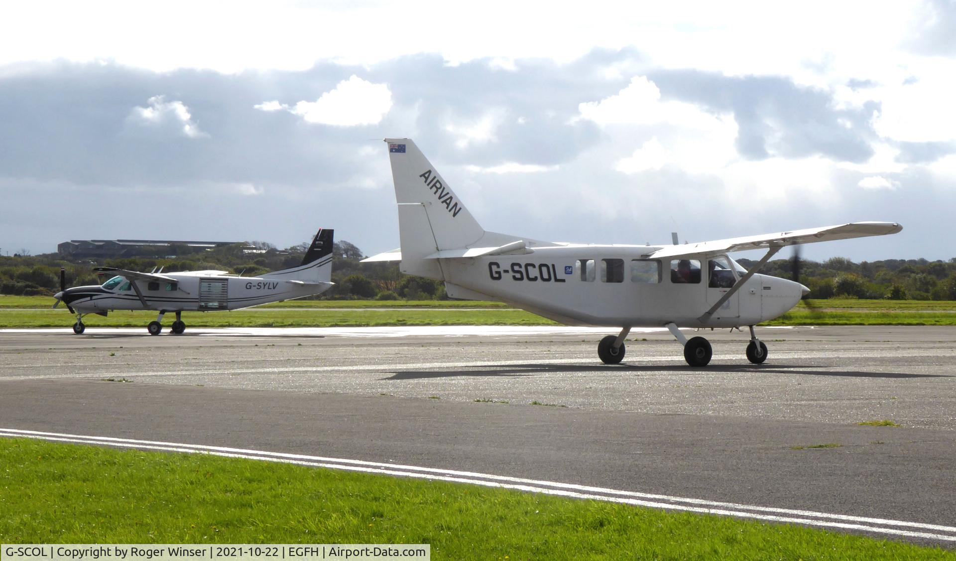 G-SCOL, 2006 Gippsland GA-8 Airvan C/N GA8-05-088, Resident Airvan with visiting Grand Caravan G-SYLV.