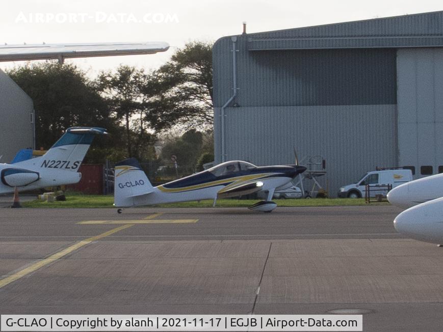 G-CLAO, 2018 Vans RV-7 C/N LAA 323-15307, Grab shot at distance with a compact camera as it was departing Guernsey
