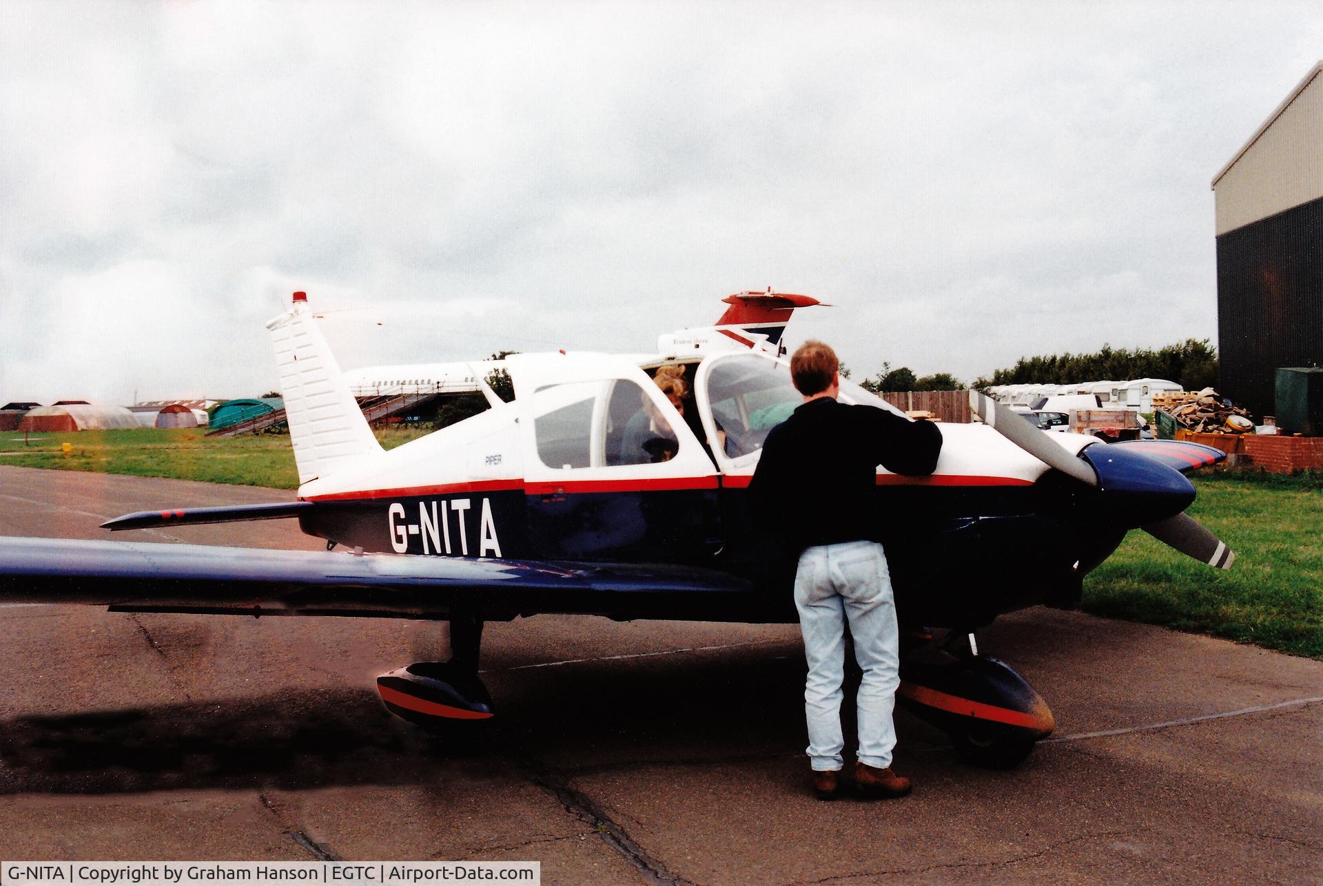 G-NITA, 1965 Piper PA-28-180 Cherokee C C/N 28-2909, Pre-flighting G-NITA at Cranfield Airport, Bedfordshire, UK