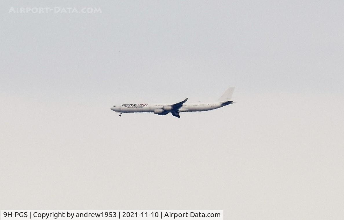 9H-PGS, 2009 Airbus A340-642X C/N 1030, 9H-PGS over the Bristol Channel.