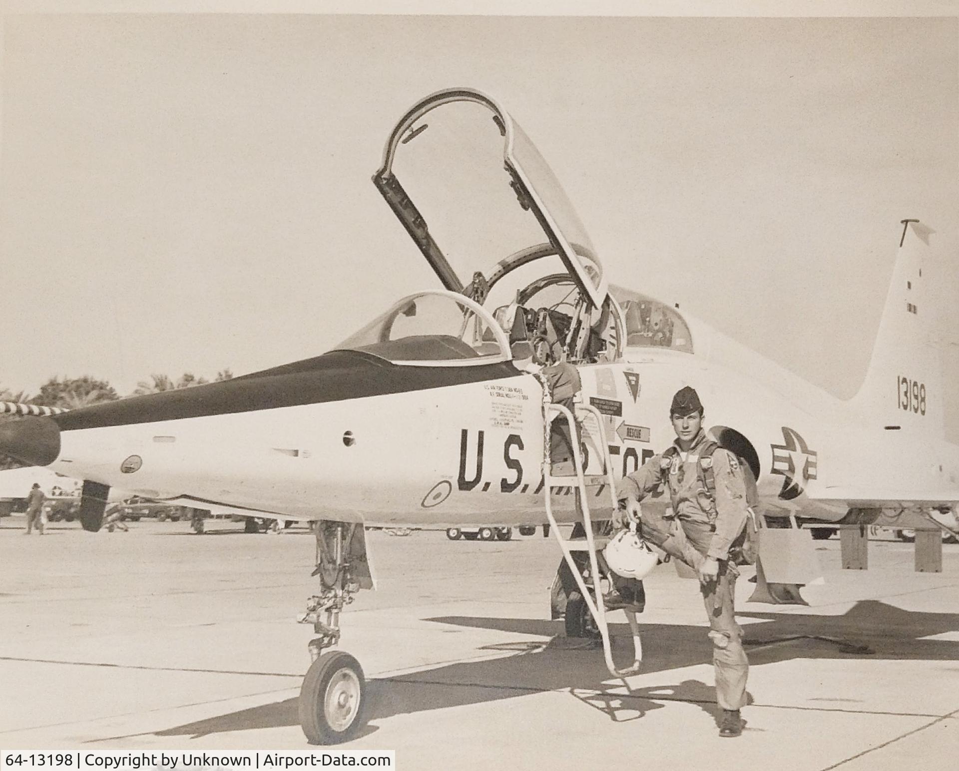 64-13198, 1964 Northrop T-38A Talon C/N N.5627, My father next to the T-38 Talon 13198 he flew in the USAF.  Unknown location, timeframe is the late 60's or early 70's