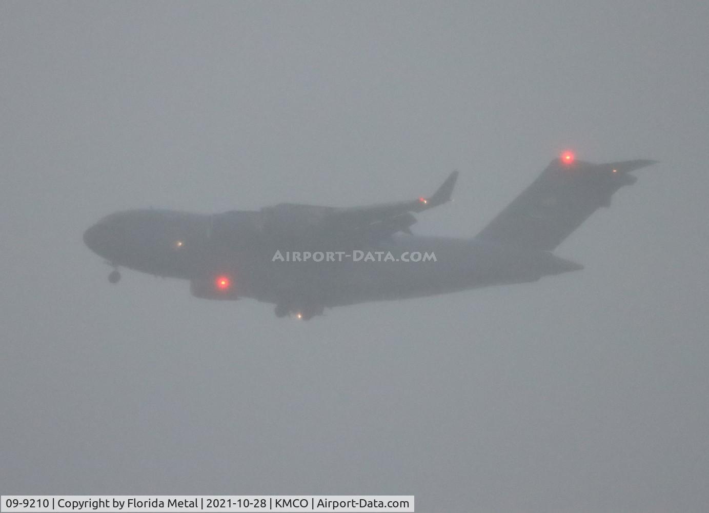 09-9210, 2009 Boeing C-17A Globemaster III C/N P-210, Arriving during heavy T-storm  MCO 2021