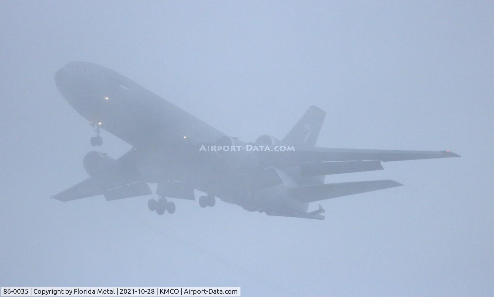 86-0035, 1986 McDonnell Douglas KC-10A Extender C/N 48248, IFR conditions, KC-10 breaking out of clouds MCO 2021