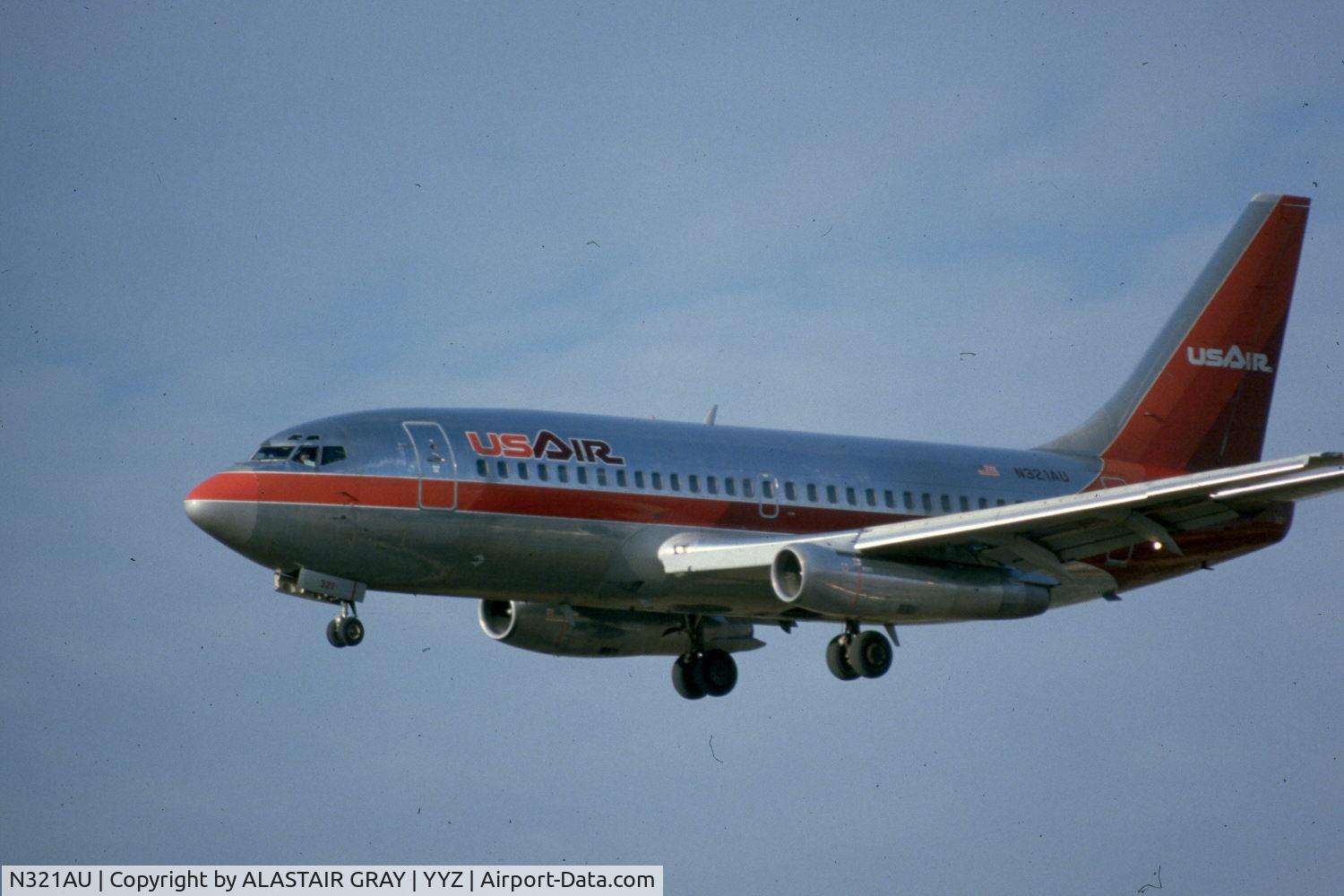 N321AU, 1983 Boeing 737-2B7 C/N 22889, Landing on runway 23 at YYZ