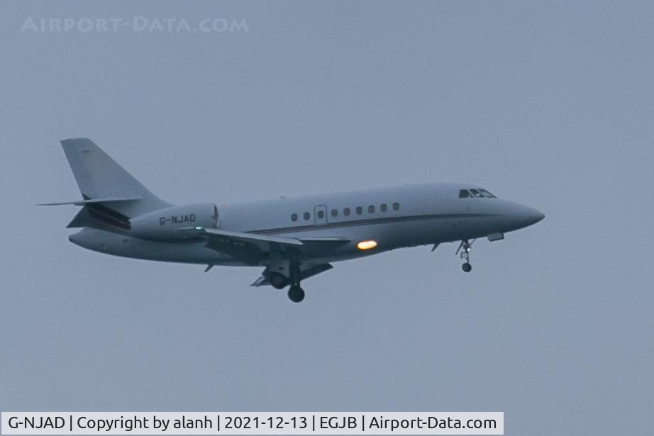 G-NJAD, 2004 Dassault Falcon 2000EX C/N 41, On approach for 27 at Guernsey