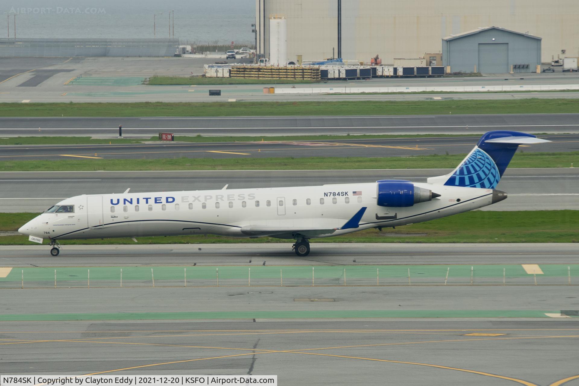 N784SK, 2009 Bombardier CRJ-700 (CL-600-2C10) Regional Jet C/N 10284, Pic taken from SkyTerrace SFO 2021.