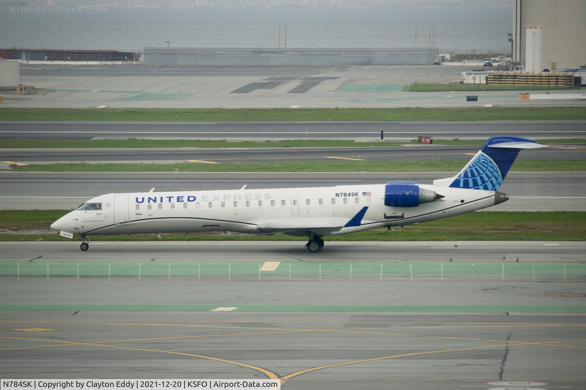 N784SK, 2009 Bombardier CRJ-700 (CL-600-2C10) Regional Jet C/N 10284, Pic taken from SkyTerrace SFO 2021.