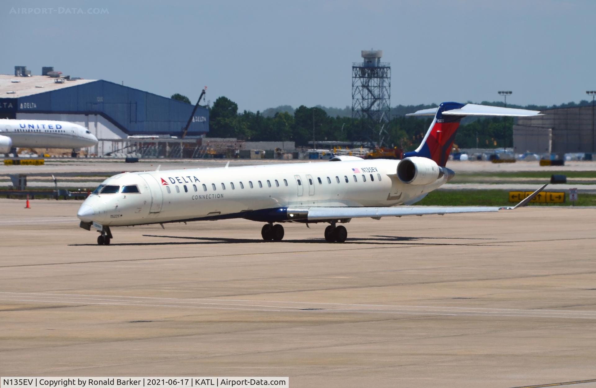 N135EV, 2009 Bombardier CRJ-900ER (CL-600-2D24) C/N 15225, Taxi for takeoff Atlanta