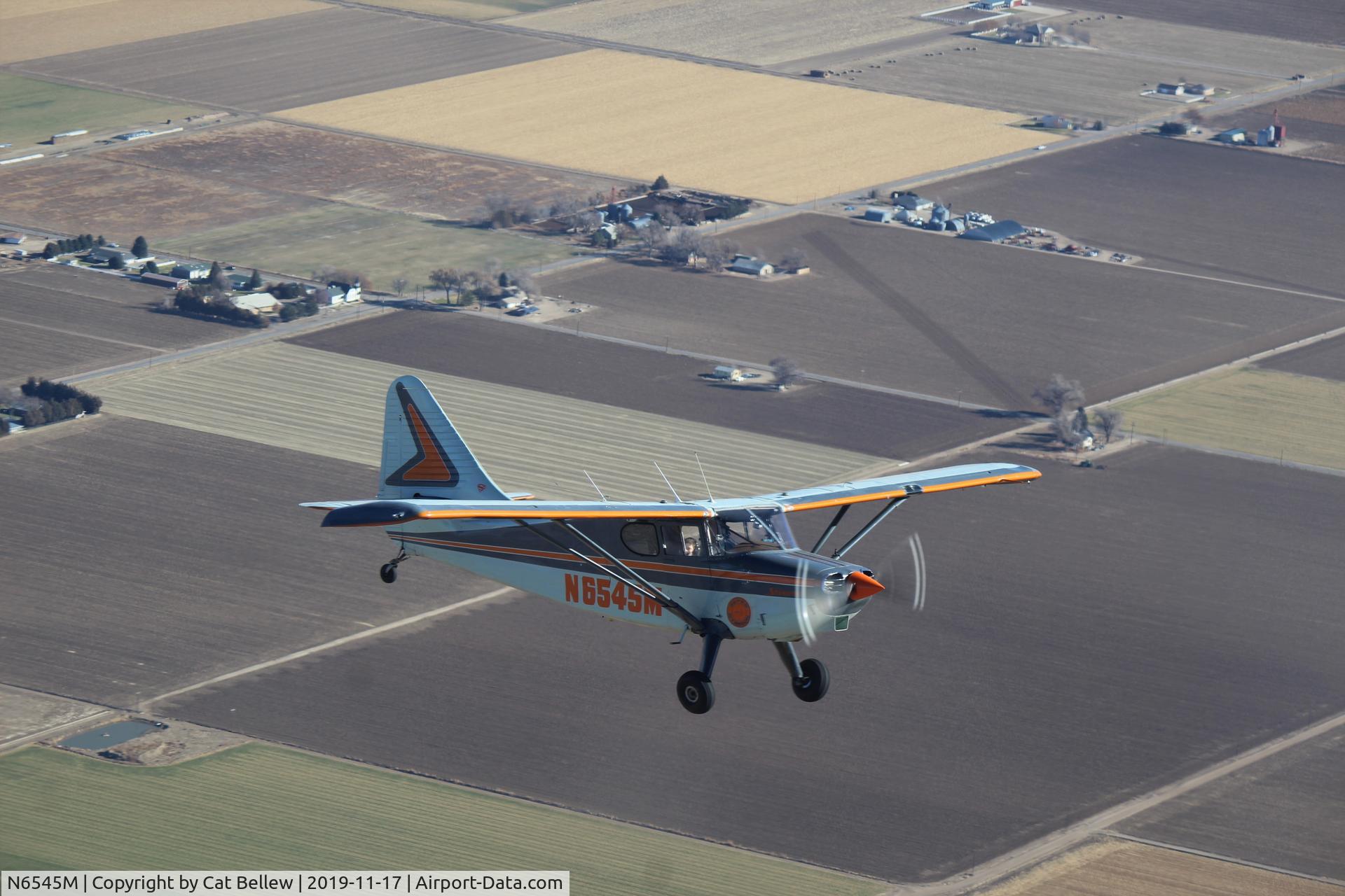 N6545M, 1948 Stinson 108-3 Voyager C/N 108-4545, Over the plains in southern Colorado.