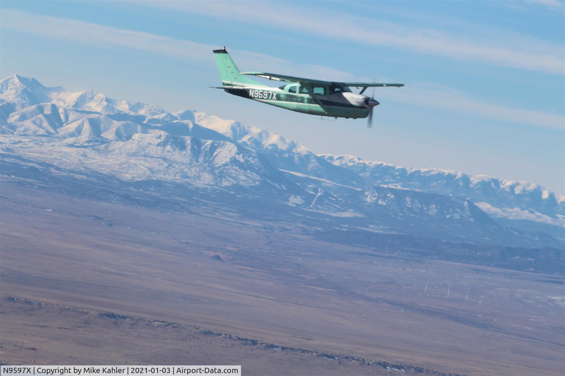 N9597X, 1962 Cessna 210B C/N 21057897, heading back to pueblo.
