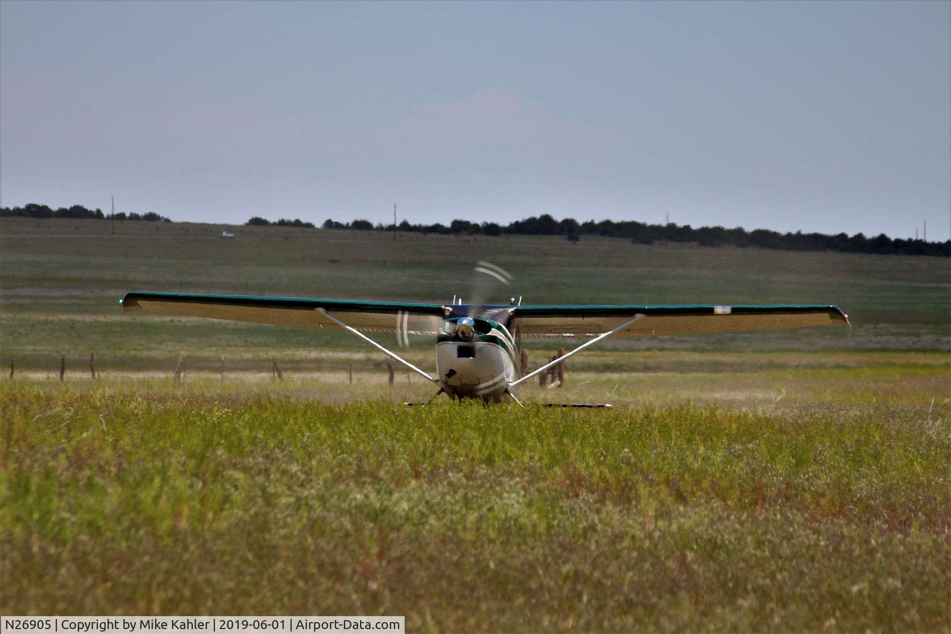 N26905, Cessna 180 C/N 18051354, Mowing the grass at Penny's.
