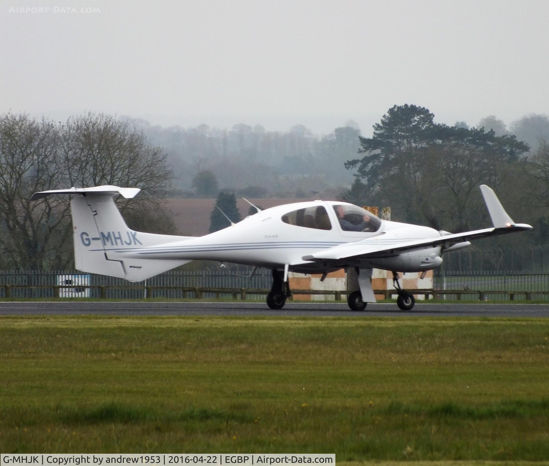 G-MHJK, 2006 Diamond DA-42 Twin Star C/N 42.173, G-MHJK at Cotswold Airport.