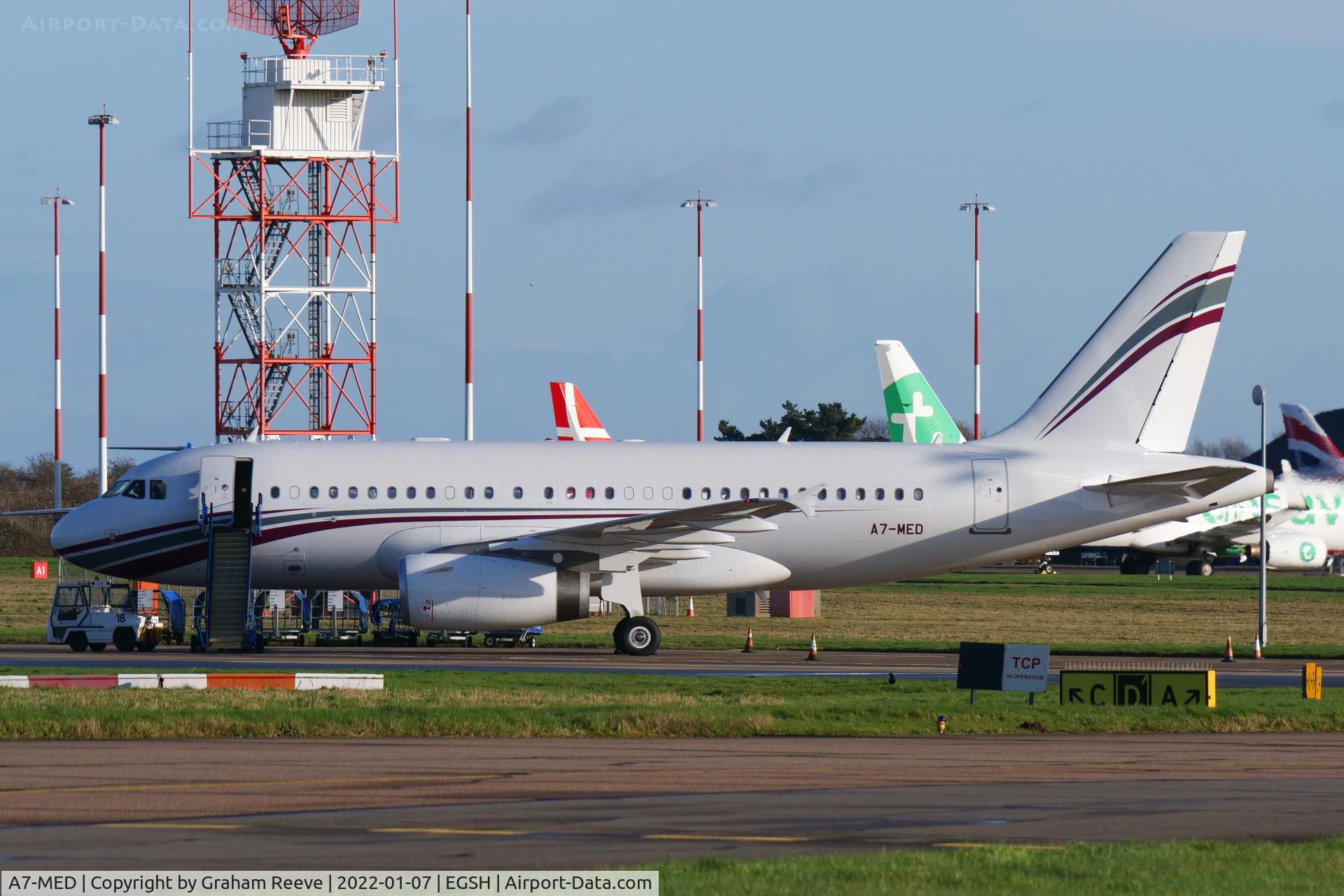 A7-MED, 2009 Airbus A319-133LR C/N 4114, Parked on stand seven at Norwich.