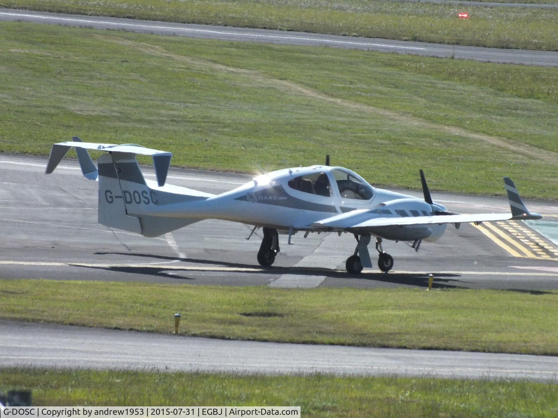 G-DOSC, Diamond DA-42M Twin Star C/N 42M.001, G-DOSC at Gloucestershire Airport.