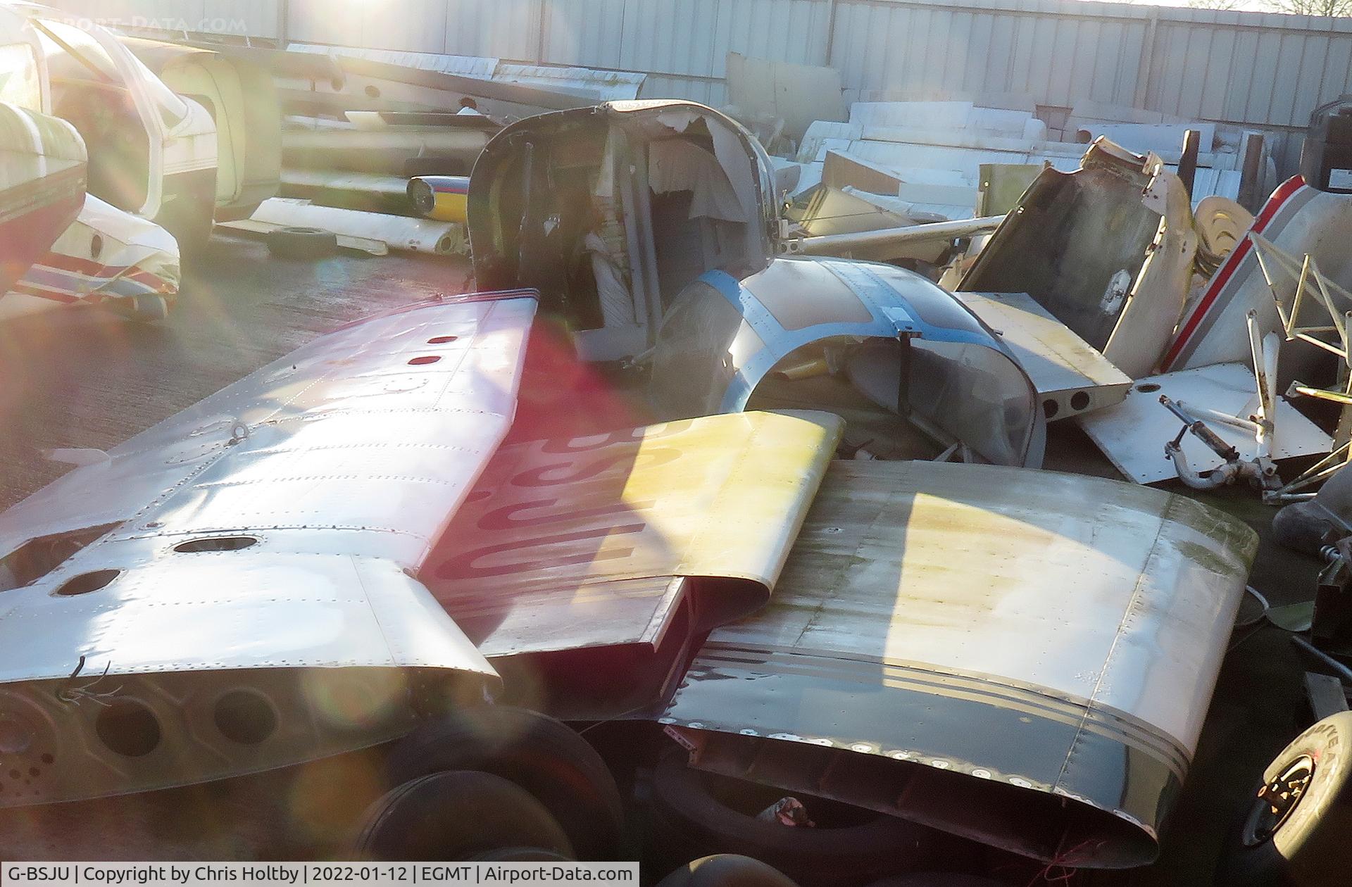 G-BSJU, 1974 Cessna 150M C/N 150-76430, Wing parts seem to be all that remains of the 150M in the wrecks at Thurrock Airfield