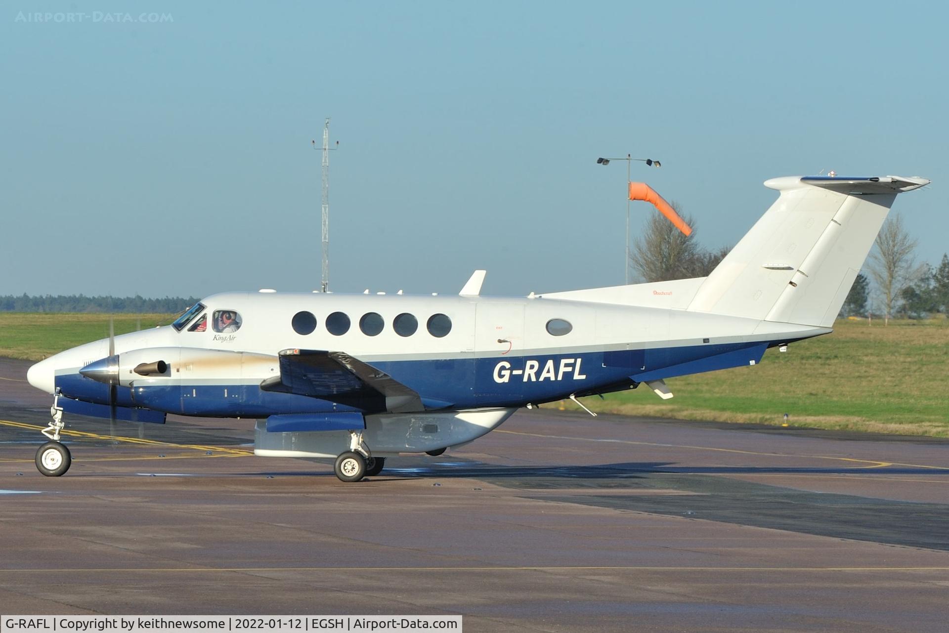 G-RAFL, 2003 Raytheon B200 King Air C/N BB-1832, Arriving at Norwich with added pannier.