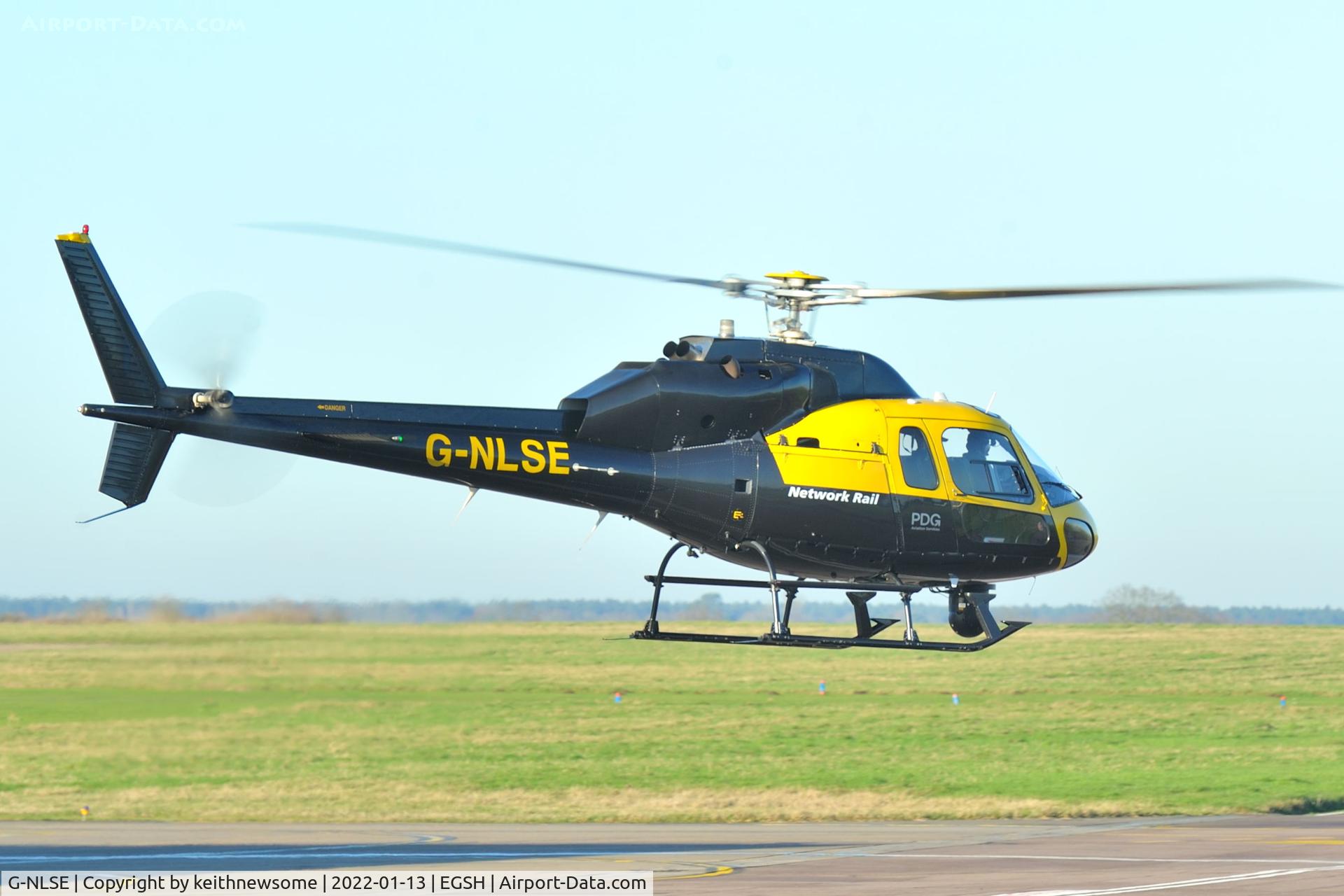 G-NLSE, 1987 Aerospatiale AS-355F-2 Ecureuil 2 C/N 5364, Leaving Norwich.