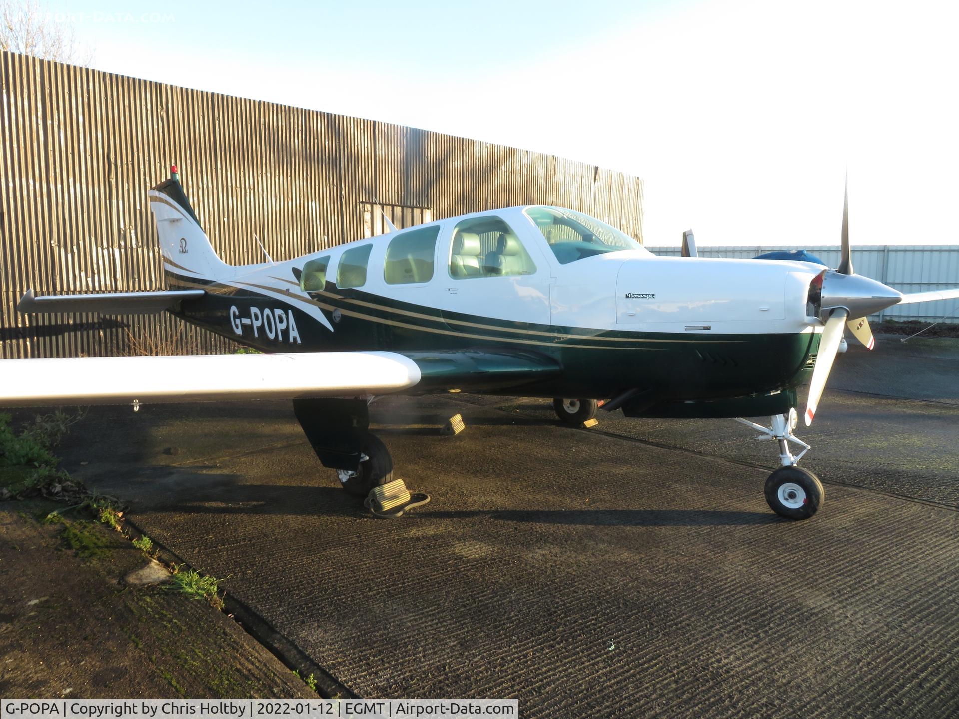 G-POPA, 1984 Beech A36 Bonanza 36 C/N E-2177, Parked at Thurrock, Essex in new colour scheme