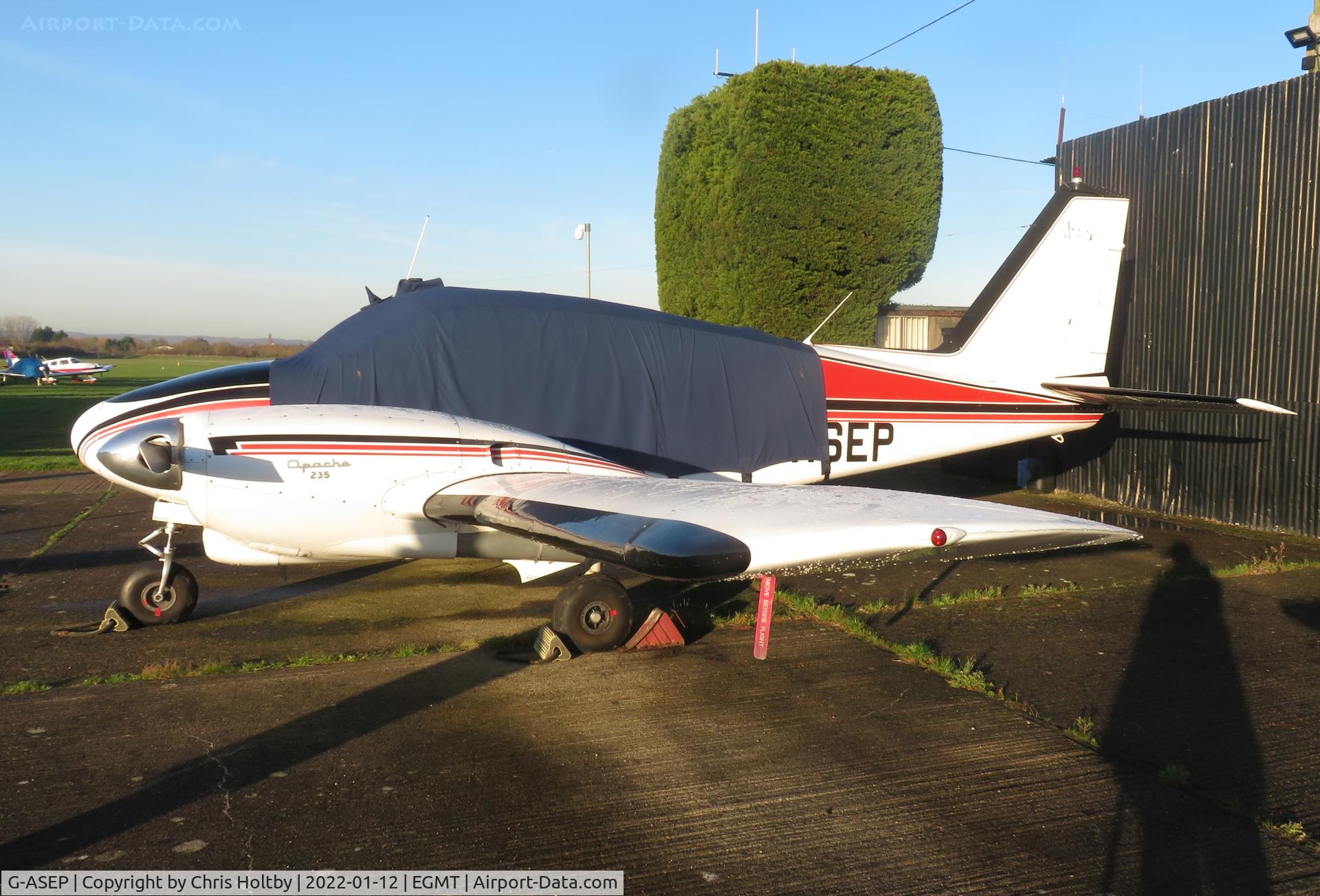G-ASEP, 1963 Piper PA-23-235 Apache C/N 27-541, Parked and covered at Thurrock Airfield, Essex
