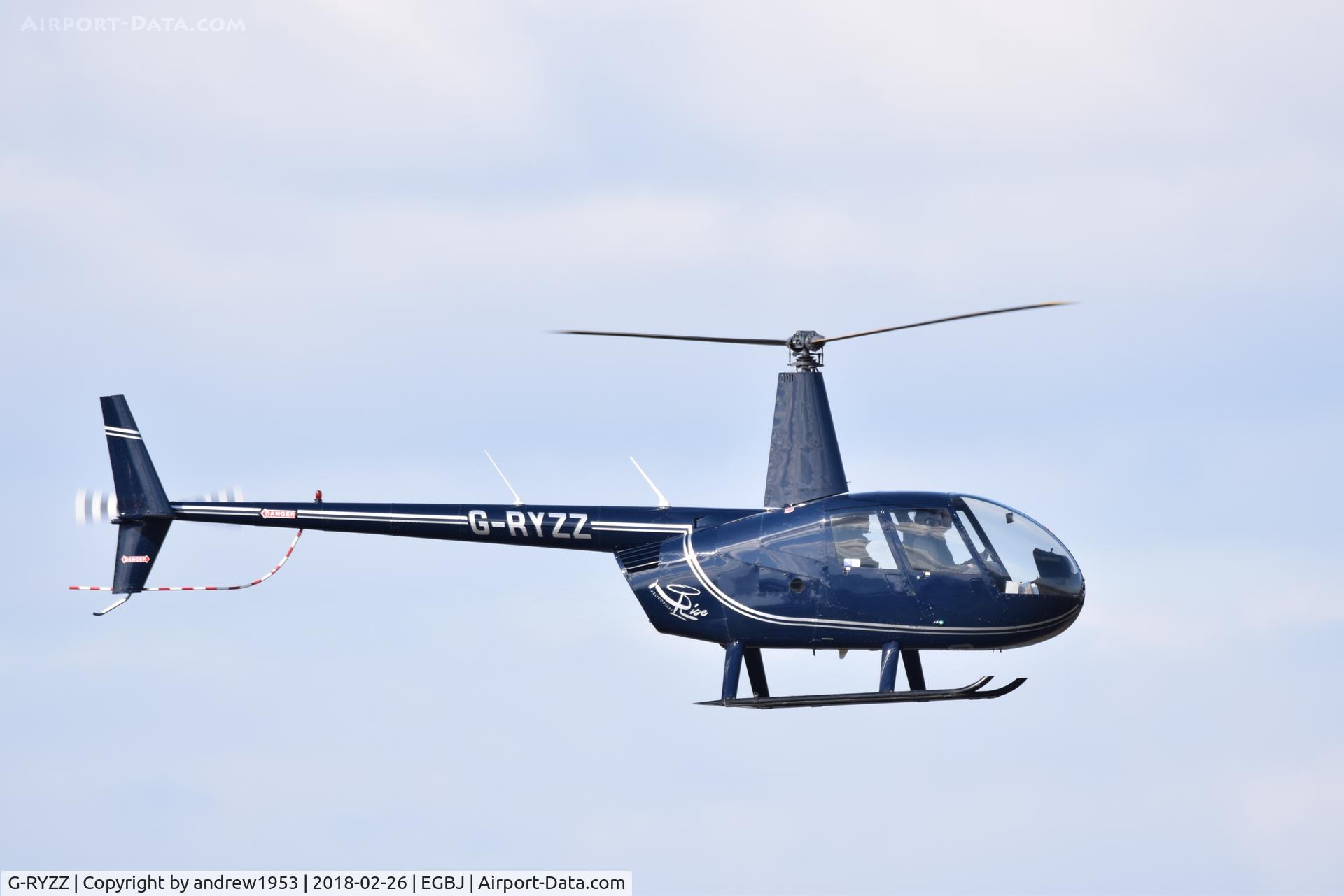 G-RYZZ, 2006 Robinson R44 Raven II C/N 11418, G-RYZZ at Gloucestershire Airport.
