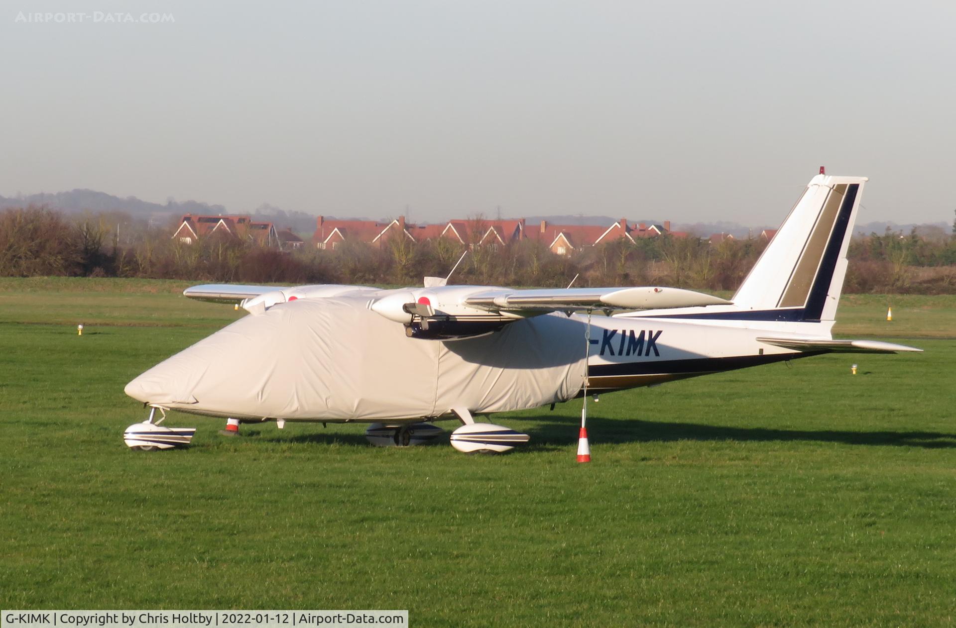 G-KIMK, 1975 Partenavia P-68B C/N 27, 1975 built Partenavia P-68B parked and covered at Thurrock Airfield, Essex