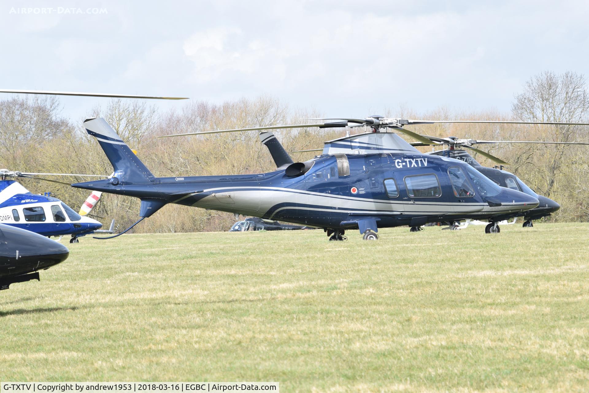 G-TXTV, 2009 Agusta A-109E C/N 11769, G-TXTV at Cheltenham Racecourse.