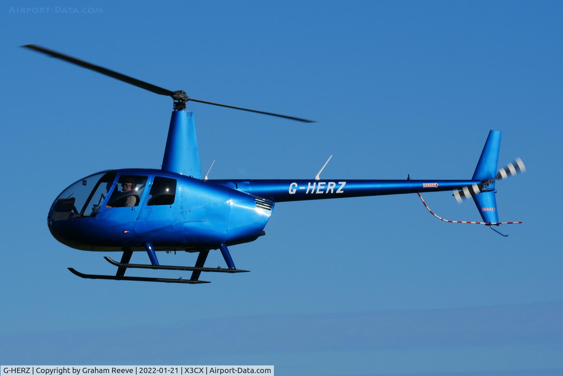 G-HERZ, 1997 Robinson R44 Astro C/N 0381, Landing at Northrepps.