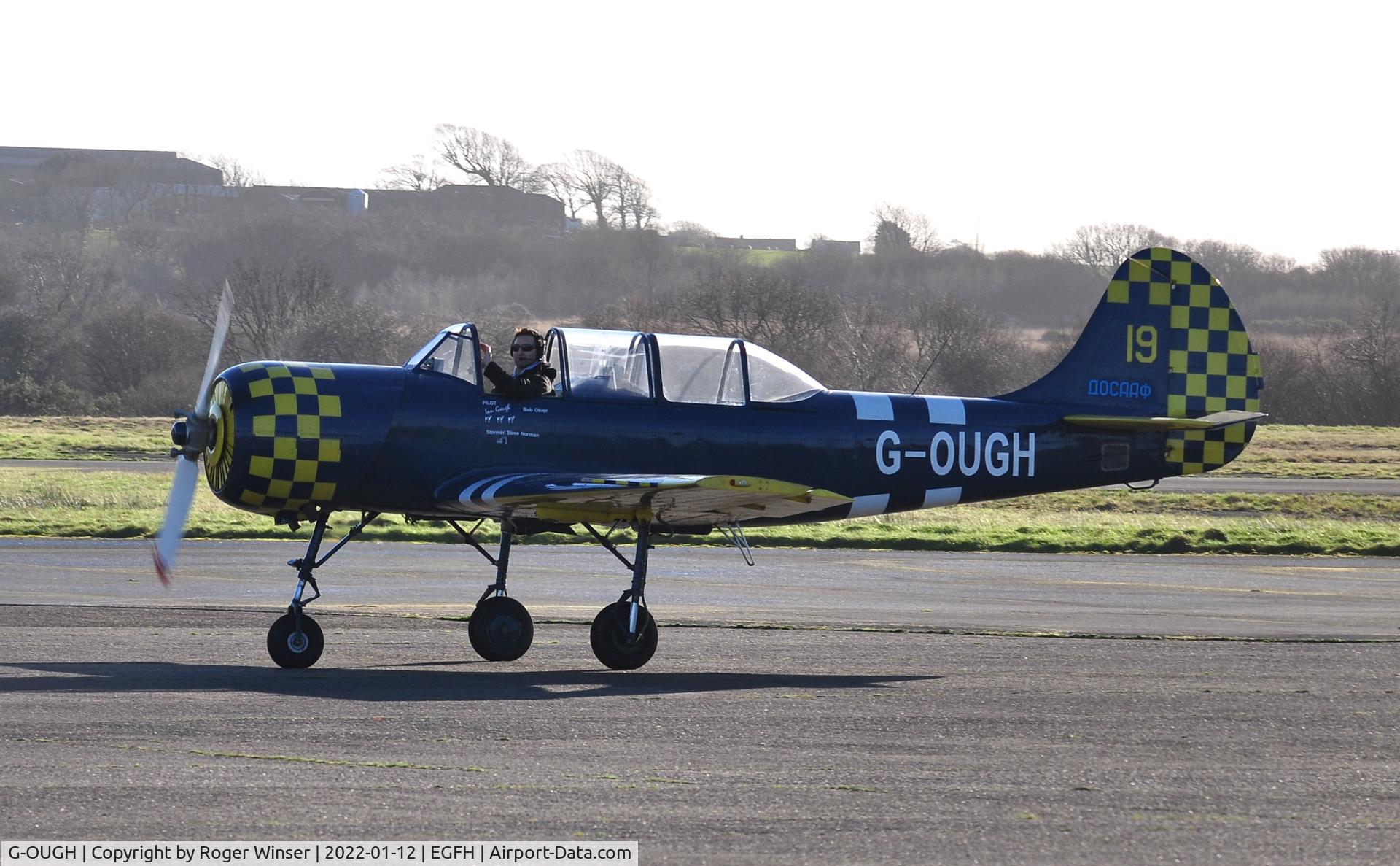 G-OUGH, 1987 Bacau Yak-52 C/N 877404, Resident Yak-52. Thanks for the wave.