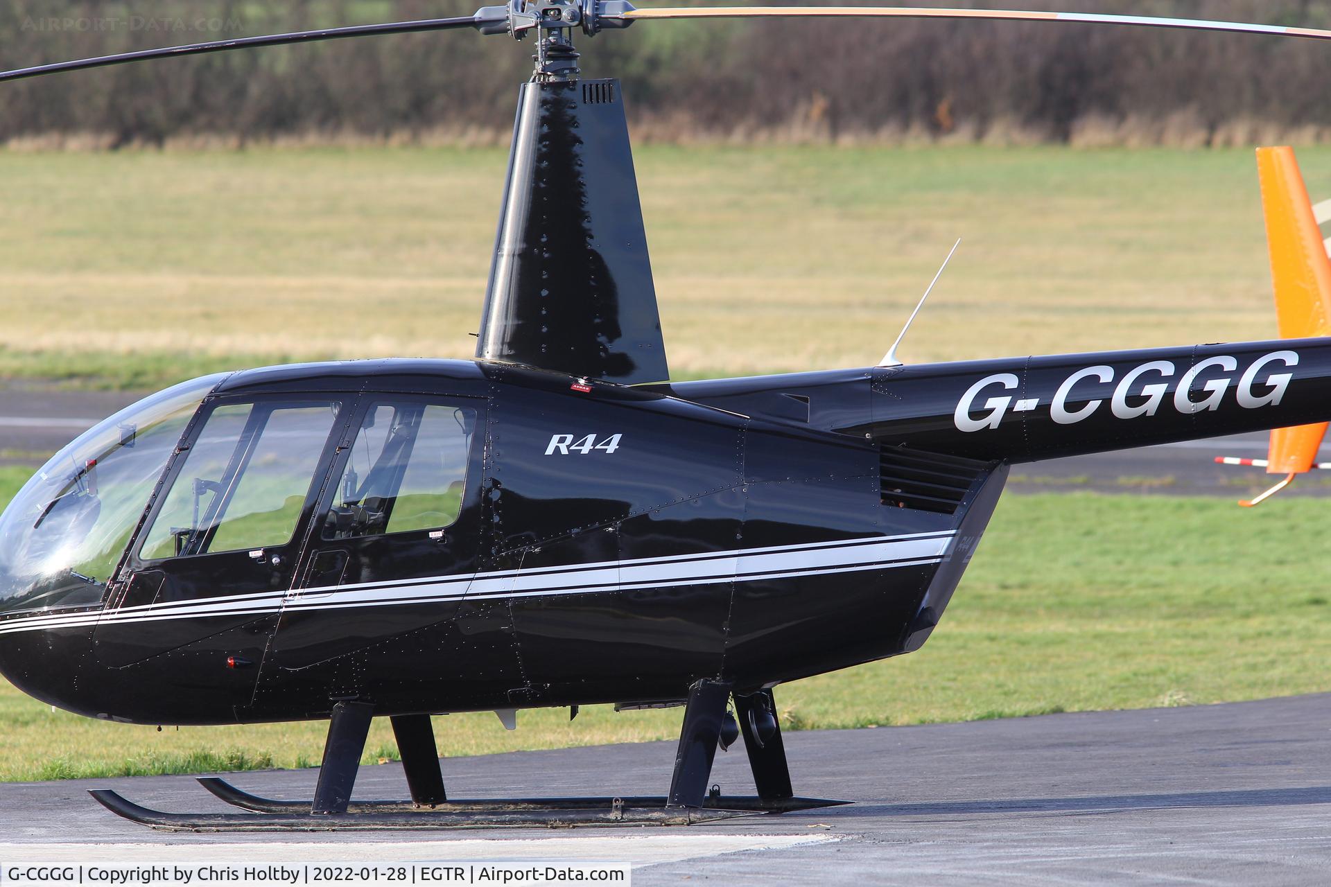 G-CGGG, 1999 Robinson R44 Astro C/N 0626, Ready for the next pleasure trippers at Elstree