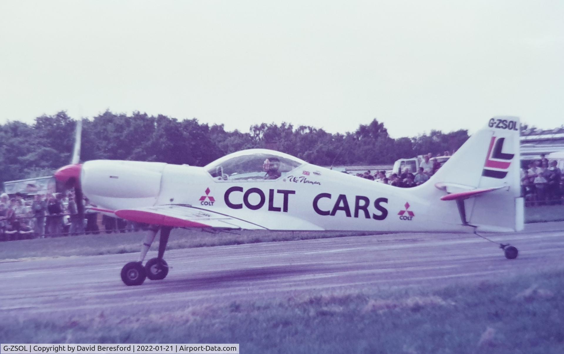 G-ZSOL, 1980 Zlin Z-50L C/N 0025, Colt Cars display aircraft, probably Woodford in 1980s