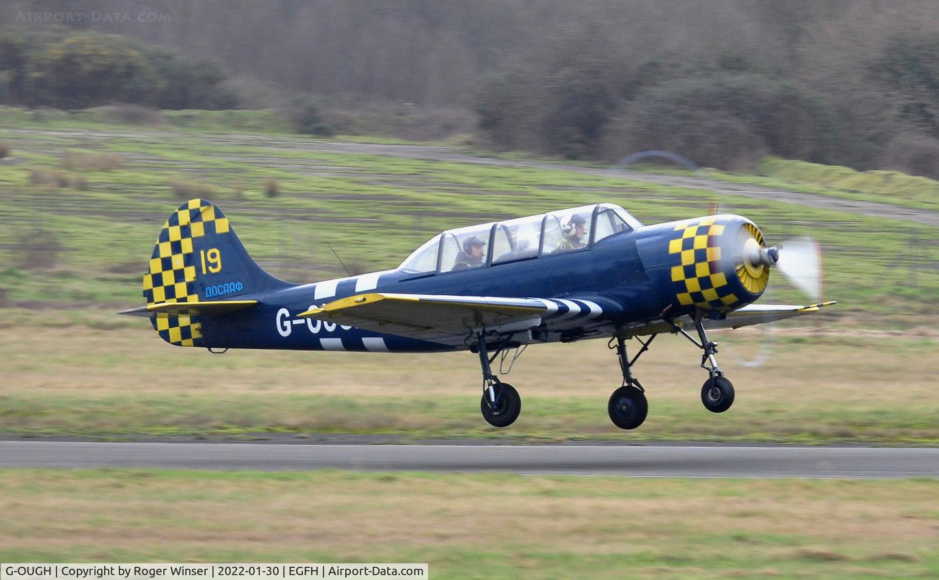 G-OUGH, 1987 Bacau Yak-52 C/N 877404, Resident Yak-52 departing Runway 28.