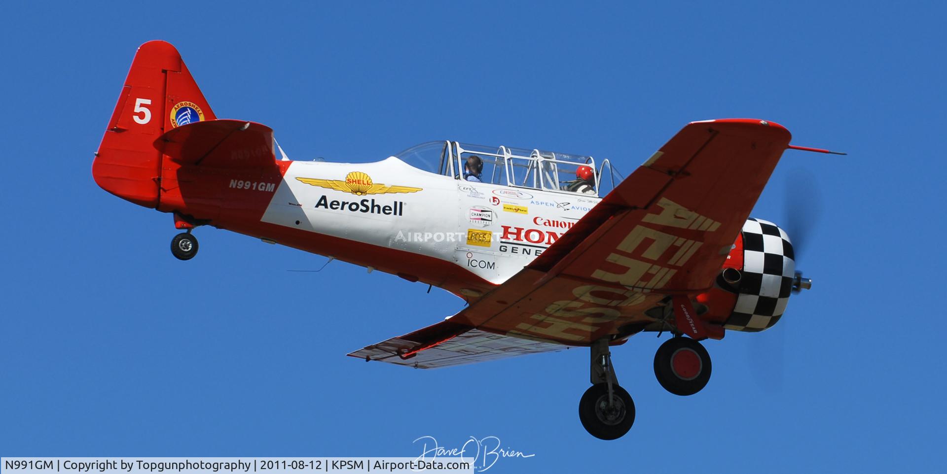 N991GM, 1941 North American AT-6C Texan C/N 88-17575, landing RW34
