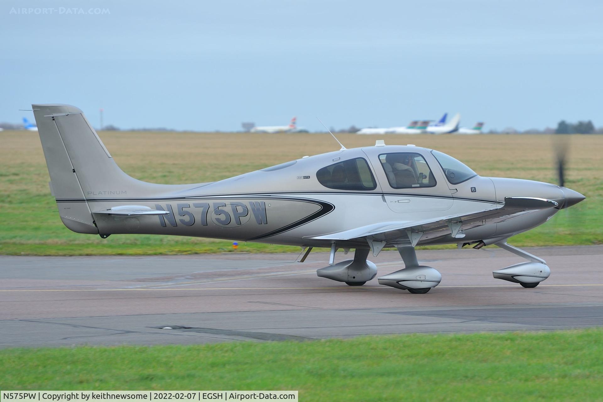 N575PW, Cirrus SR-22 GTS Platinum C/N 2442, Leaving Norwich for Blackpool.
