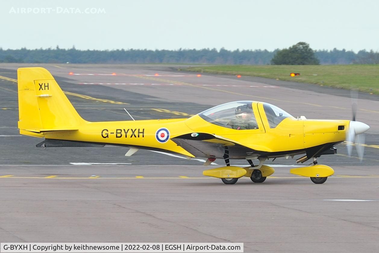 G-BYXH, 2001 Grob G-115E Tutor T1 C/N 82168/E, Leaving Norwich for Wittering.
