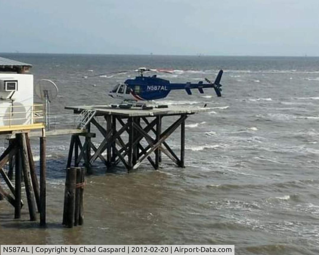 N587AL, 1998 Bell 407 C/N 53248, N587AL sitting on the Helideck at Calliou Boca facility in the Gulf of Mexico.