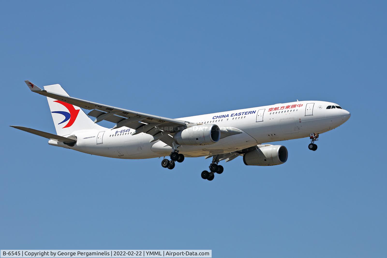 B-6545, 2011 Airbus A330-243 C/N 1291, Short final runway 16.